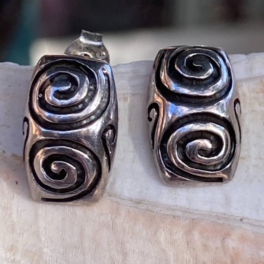 Cute little sterling silver post earrings with double swirls